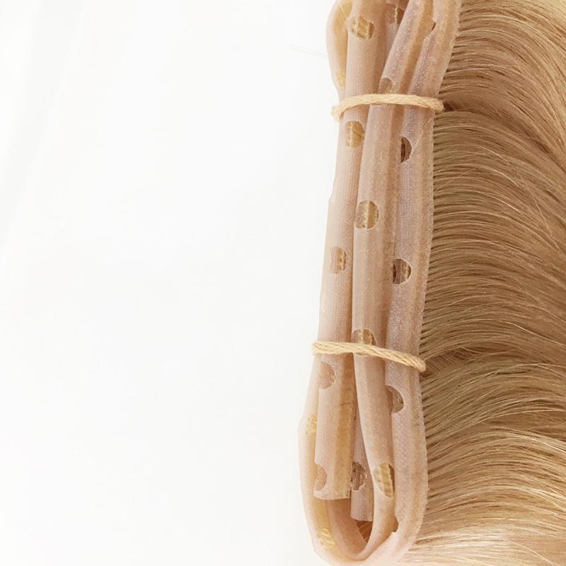Twin tab weft